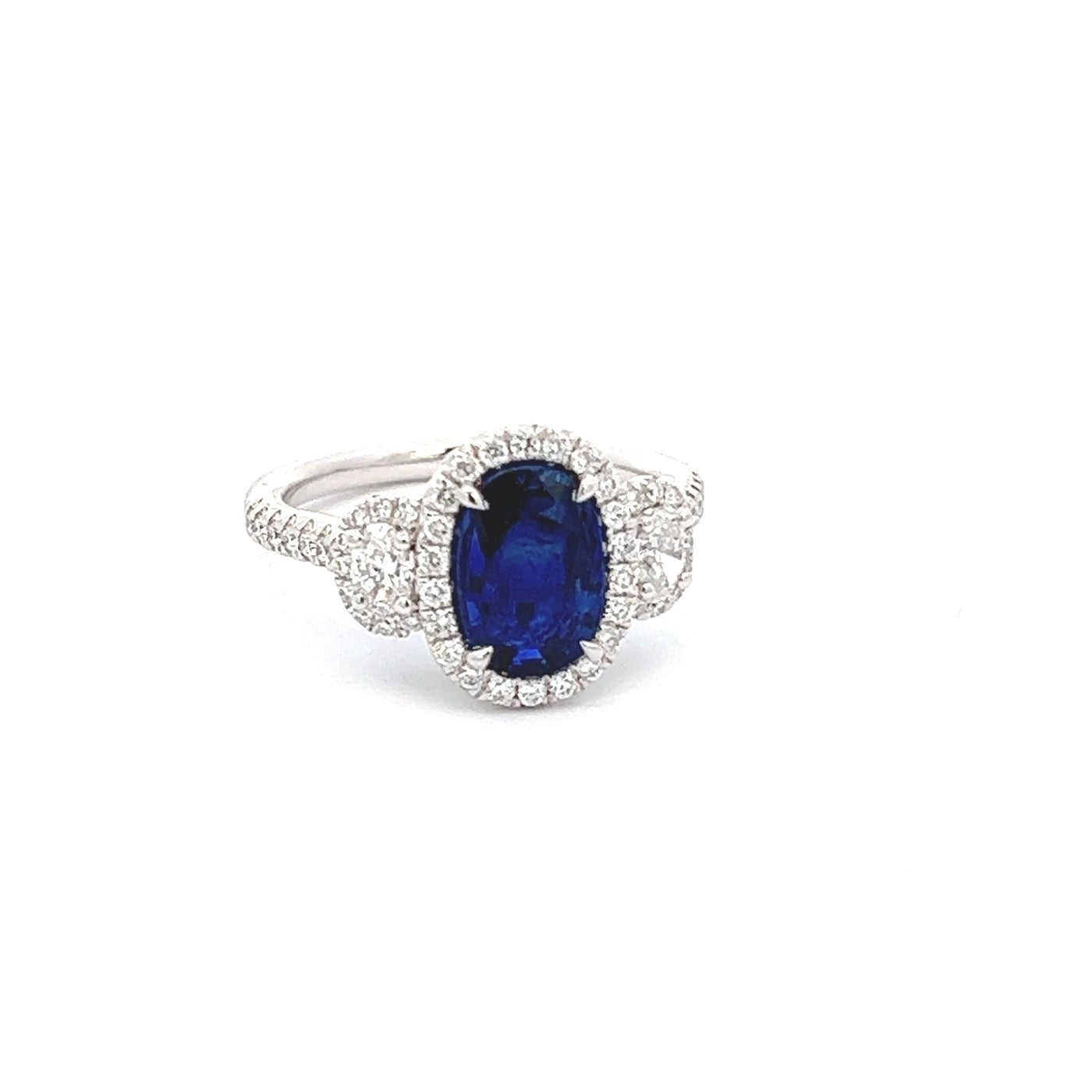 Three Stone Sapphire and Diamond Ring